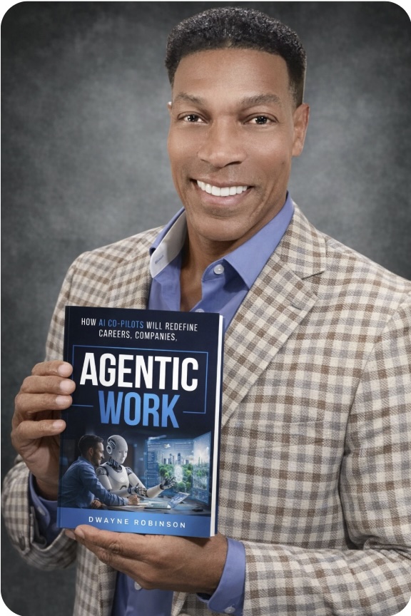 Dwayne Robinson, founder of EBA, holding his book Agentic Work